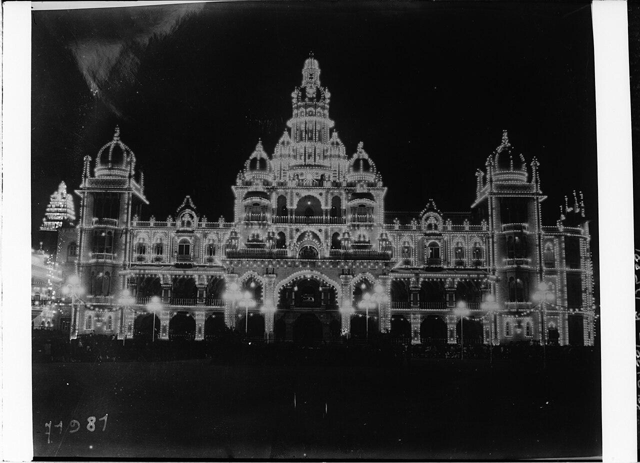 Mysuru Palace lit up at night for a royal visit, January 1922.